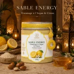 Gommage Sable Energy ArganDrip — ambiance spa marocain chaude avec citron, miel et argan